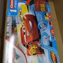 Carrera First Disney/Pixar Cars - Slot Car Race Track - Includes 2 Cars: Lightning McQueen and Dinoco Cruz - Battery-Powered Beginner Racing Set for Kids Ages 3 Years and Up, Medium