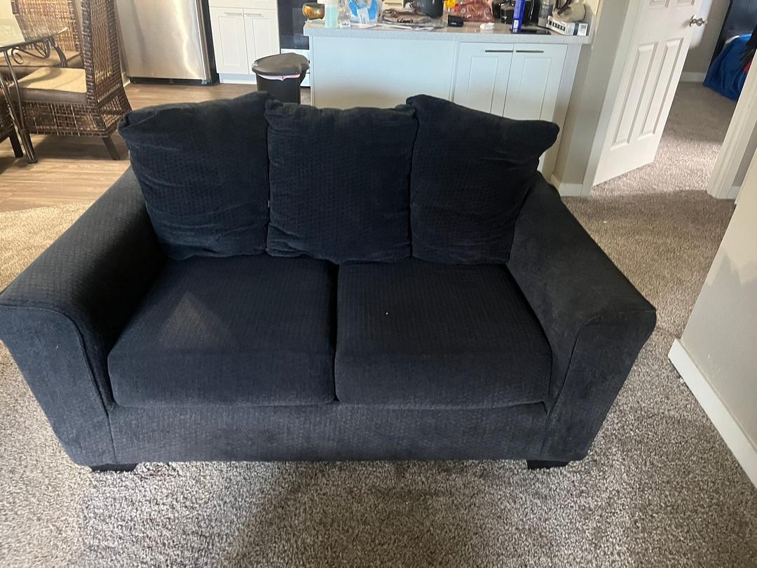Black Loveseat 64"L x 38"D x 36"H