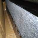 Accent Chair, Chesterfield Inspired Club Chair in Charcoal Fabric, Deep Button Tufting, Scrolled Tuxedo Arms, Birch Wood Legs, Ideal for Living Room Decor. Animal fur. There is a Dent.