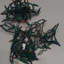 Novelty Lights 8.5 Feet 20 Bulb Multicolor Mini Light String on Green Wire, Non-Connectable Incandescent Fairy Lights for Bottles and Crafts, 4" Bulb Spacing, 24" Lead, Stackable Fused Plug