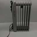 Oil-filled Heater With Thermostat Owner's Manual Model: NDB-1Y