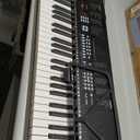 Vangoa 61-Key Light-Up Keyboard Piano for Beginners, 350 Tones & Timbres, 3 Teaching Modes, With Microphone, Black