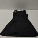 QINSEN Womens Open Back Tennis Dress Sleeveless Built in Shorts Golf Athletic Dress with Pockets (Medium, Black)