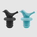 OGGI® Silicone Bottle Stoppers 2 ct & Green Dyno Toy &   Triangle Powder Puff Set