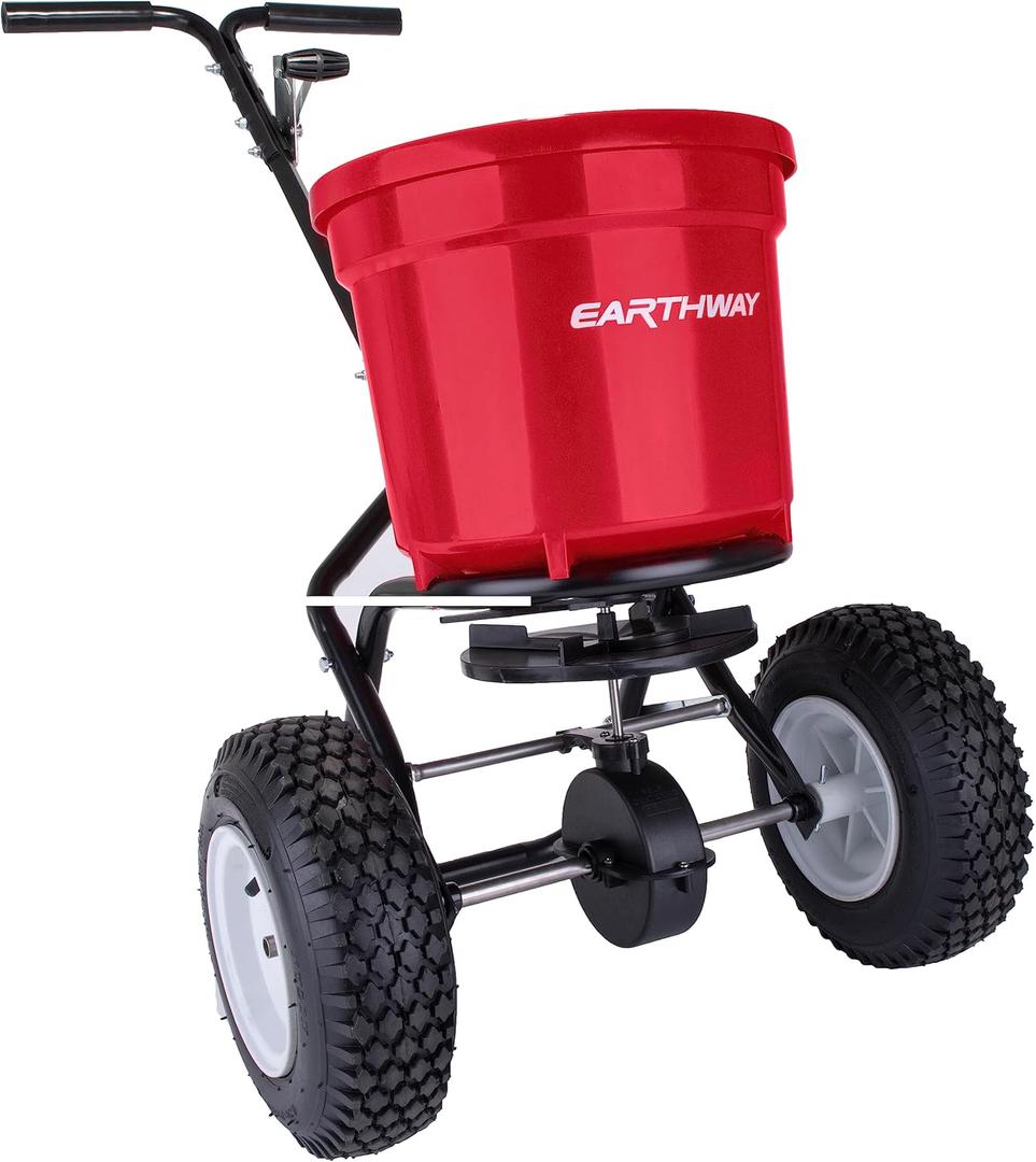 EarthWay 2150 Commercial 50 LB Broadcast Fertilizer Spreader. Heavy-Duty Walk-Behind Push Garden Seeder with Adjustable Drop Rate and Driving Handle. Large 13 inch Pneumatic Stud Tires