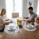 Silver Placemats Set of 4 Round PVC Table Mats 15 Inches Decorative Heat Resistant Placemats for Dining Holiday Wedding Party Easy to Clean Kitchen Mats with Leaf Cut-Out Design Home Decoration