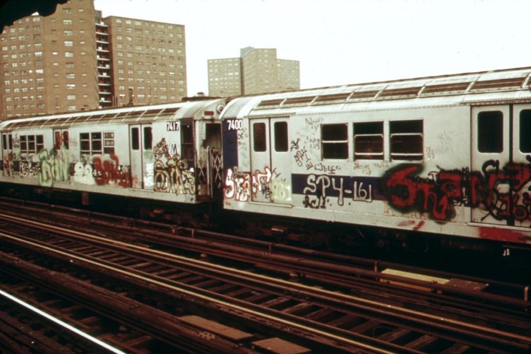 ART.COM Wall Photo A Graffiti Painted Subway Train with Housing Projects in the Background, May 1973, 18" x 12"
