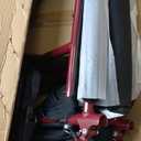 Medline Lightweight Foldable Transport Wheelchair with Handbrakes and 12-Inch Wheels, Red Frame, Black Upholstery