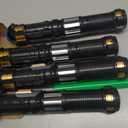 Cawiew 4 Pack Light up Sword Saber with FX Sound (on-Off Control) and Full Retractable Handle, 4 Colors LED Glow in The Dark Toy for Kids Adult