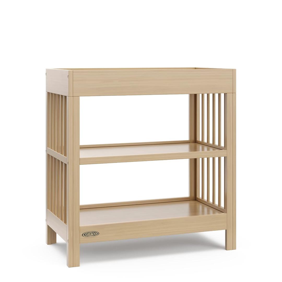 Graco Teddi Changing Table with Water-Resistant Changing Pad (Driftwood) - GREENGUARD Gold Certified, Includes Bonus Water-Resistant Changing Pad with Safety Strap, 2 Shelves, Easy-to-Match