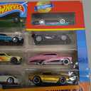 Hot Wheels, Set of 8 Basic Toy Cars & Trucks in 1:64 Scale, Includes 1 Exclusive Car, Different Mixes Released Throughout The Year