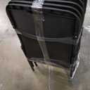 Amazon Basics Sturdy Foldable Plastic Chair, Portable, 350-Pound Capacity, Black, 6-Pack