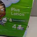 Puffs Facial Tissues Plus Lotion, 4 Family Boxes, 124 Facial Tissues per Box, Allergies and Colds 