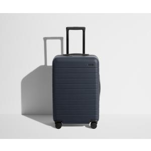 Away Bigger Carry-On Luggage, Lightweight Hardside Large Suitcase with Spinner Wheels, TSA Lock, Airline Approved, Navy Blue
