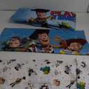Disney Toy Story It's Play Time Blue, Green, Red, and Yellow, Woody and Buzz 4 Piece Toddler Bed Set - Comforter, Fitted Bottom Sheet, Flat Top Sheet, and Reversible Pillowcase
