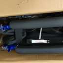 Medline Lightweight Foldable Transport Wheelchair with Handbrakes and 12-Inch Wheels, Blue Frame, Black Upholstery