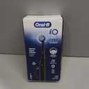 Oral-B Rechargeable Electric Toothbrush, iO2 Starter Kit, 3 Cleaning Modes, Automatic Pressure Sensor to Protect Gums, 2 Brush Heads, Night Black