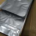 BAAGGNAA 60 Pack High Barrier Stand-Up Coffee Bean Bags with Vented Valve, Matte Metallic, Heat-Sealable and Resealable Solid Color Pouches for Food Storage (5.1 * 8 inch,1/2 lb,8 oz,Silver)
