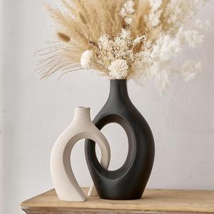 AWNR Large Ceramic Vase Decor: 2 Pcs Black & White Crossed Vases for Flowers Hollow Flower Vase Decorative Vase Modern Home Decor for Living Room Shelf Mantel Dinning Table Decorations Office