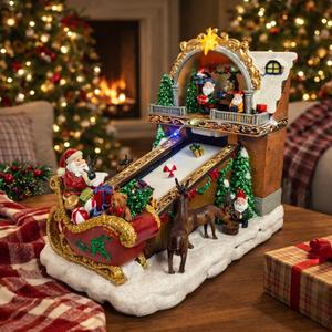 MOMENTS IN TIME Animated Santas Toy Shop Conveyor Belt Lighted Christmas Village Building with LED Lights, Music & Moving Sleigh Scene Plug-in Power Adapter Included