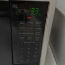 GE Countertop Microwave Oven, Compact 0.9 Cubic Ft., 900-watt Capacity, 7 Auto Cooking Settings, Child-Lock Technology, Kitchen Essentials for The Countertop, Dorm Room or Apartment, Stainless Steel