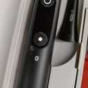 Oral-B iO Deep Clean + Protect Rechargeable Electric Toothbrush, Black, iO Series 7, 2 Replacement Brush Heads, Charging Travel Case