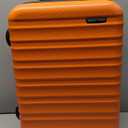 Amazon Basics 21" Hardside Carry-On Luggage, Hardshell Suitcase With Wheels, Expandable For Up to 25% More Space, With Scratch-Resistant Surface, Four Multi-directional Wheels, Orange
