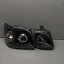 AnzoUSA 111170 Black Clear/Amber Projector Halo Headlight for Lexus LX470 - (Sold in Pairs) One Pack Only Right side