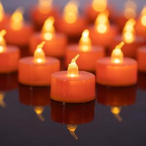 LANKER 24 Pack Orange Tea Lights Candles, Flickering Warm Yellow Flameless LED Tealights, Long Lasting Battery Operated Fake Candles, Decoration for Wedding, Halloween and Christmas (Orange)