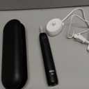 Oral-B Rechargeable Electric Toothbrush, iO Limited Simple Clean, 3 Cleaning Modes, Automatic Pressure Sensor to Protect Gums, Travel Case, Night Black (1 Count (Pack of 1))