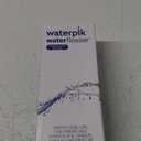 Waterpik Cordless Pulse Rechargeable Portable Water Flosser for Teeth, Gums, Braces Care and Travel with 2 Flossing Tips, Waterproof, ADA Accepted, WF-20 White, Packaging May Vary