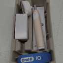 Oral-B iO Deep Clean + Protect Rechargeable Electric Toothbrush, White with a iO Series 7 Toothbrush, 2 Replacement Brush Heads, and a Charging Travel Case