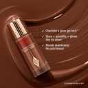 Charlotte Tilbury Hollywood FlawlessFilter - MultiUse Makeup Primer, Complexion Booster & Illuminating Liquid Highlighter with Sheer Coverage - Smooths & Blurs Skin