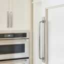 Amerock Maymont 8-13/16" Polished Nickel Backplate | Decorative zinc cabinet hardware backplate designed to complement knobs and pulls while protecting cabinet surfaces