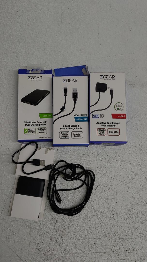 Lot of Z Gear, Gear Slim Power Bank With Duel Charging Ports, 6 FT Sync and Charging Cable, And Adaptive Fast Charge Wall Charger.
