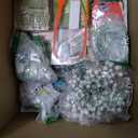 Box With Mixed Items, Retail Is Estimated