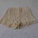 LUXVEER Womens Summer Shorts Trendy Ruffle Lace High Waisted Smocked Beach Mini Shorts Y2K Micro Boyshorts Lolita Bloomers XS
