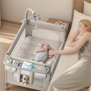 TinyGlow Baby Bassinet, Pack and Play, Bedside Crib Sleeper, Diaper Changer
Quickly Assembles and Folds, Portable Crib with Mattress,Mosquito Net and Toys Bar, Easy to Carry for Newborn to Toddler