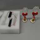 Lighted Christmas Gingerbread Pathway Stakes (Set of 2). Add a whimsical touch to your holiday decor with these adorable Gingerbread Man stakes. 