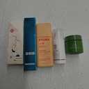 Hair-like Strokes Eyebrow Pen; EltaMD UV Clear Face Sunscreen SPF 46;  JUICE Play Up Lip Crayon-Play; BYOMA SPF 50 Face Fluid; Aveda Be Curly Advanced Intensive Curl Perfecting Masque