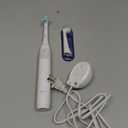 Oral-B iO Series 2 Rechargeable Electric Powered Toothbrush Starter Kit, Pure White with 2 Brush Heads - Automatic Pressure Sensor to Protect Gums - 3 Modes - 2 Min Timer