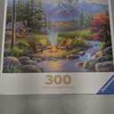 Ravensburger - Riverside Livingroom - 300 Piece Large Format Jigsaw Puzzle - Serene Vision of a Rustic Cabin, Mountains & Stream - Frameable - Premium Quality - Puzzles for Adults