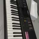 RockJam Compact 61 Key Keyboard with Sheet Music Stand, Power Supply, Piano Note Stickers & Simply Piano Lessons