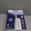 Oral-B iO Simple Clean Rechargeable Electric Powered Toothbrush, Pure White with 1 Gentle Care Brush Head and 1 White Travel Case - Automatic Pressure Sensor to Protect Gums - 3 Modes -2 Min Timer