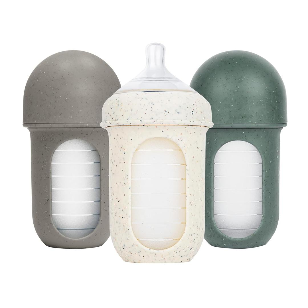 Boon Nursh Bottles - Silicone Baby Bottles Help Ease Colic Symptoms - Reusable Food-Grade Silicone Pouches with Polypropylene Shell - Medium Flow - 8 Oz - Speckle Green