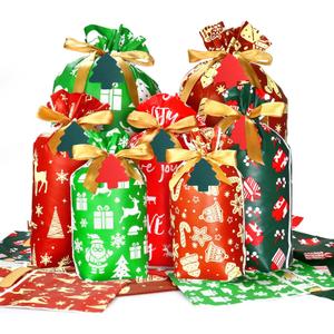 QAZMJUE 75PCS Christmas Drawstring Gift Bags, 5 Designs Large Medium Small Xmas Wrapping Bags with Tags, Holiday Party Favors for Presents Goody Bags Decorations