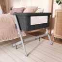 Dream On Me Skylar Bassinet and Bedside Sleeper, Adjustable Heights, Breathable Mesh Sides, Plush Mattress Pad, Wheels with Safety Locks & Tool-Free Assembly, Compact Fold & Travel Bag - Black