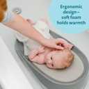 The First Years Sure Comfort Baby Bather - 50% Recycled Material Baby Bath Seat - Baby Bath Support for Infants - Newborn Bath Essentials Ages 0 to 5 Months