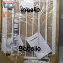 BABELIO Baby Gate for Doorways and Stairs, 26-31" Pet Gate with Wide Walk Thru Door and Lock Indicator, No Drill Pressure Mounted Safety Gate with Double Lock and Self-Closing, White