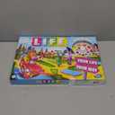 The Game of Life Game, Family Board Game for 2-4 Players, Indoor Game for Kids Ages 8 and Up, Pegs Come in 6 Colors